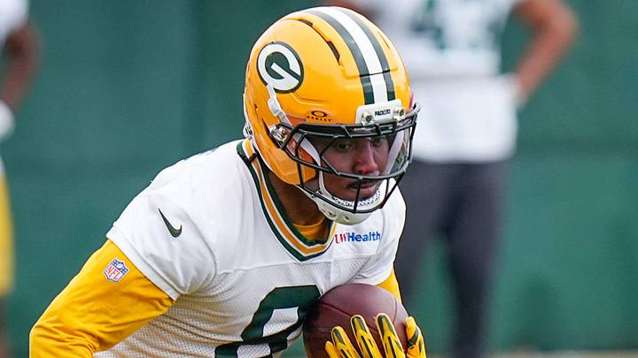 Green Bay Packers running back Josh Jacobs (8) runs drills during the first day of the three-day minicamp.