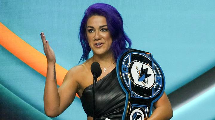 Jun 27, 2025; Los Angeles, California, USA; Bayley, WWE wrestler, announces the 30th overall pick for the San Jose Sharks in the first round of the 2025 NHL Draft at Peacock Theater. Mandatory Credit: Kirby Lee-Imagn Images Jun 27, 2025; Los Angeles, California, USA; Bayley, WWE wrestler, announces the 30th overall pick for the San Jose Sharks in the first round of the 2025 NHL Draft at Peacock Theater. Mandatory Credit: Kirby Lee-Imagn Images