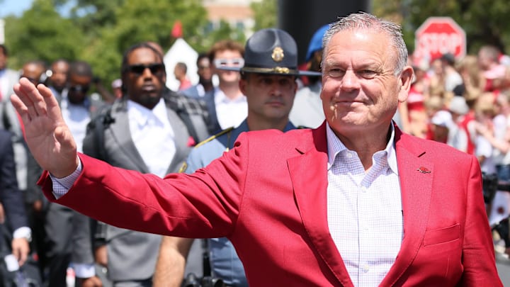Arkansas Razorbacks coach Sam Pittman walks to the stadium during the hog walk prior to the game against the Alabama A&M Bulldogs at Razorback Stadium. Arkansas Razorbacks coach Sam Pittman walks to the stadium during the hog walk prior to the game against the Alabama A&M Bulldogs at Razorback Stadium.