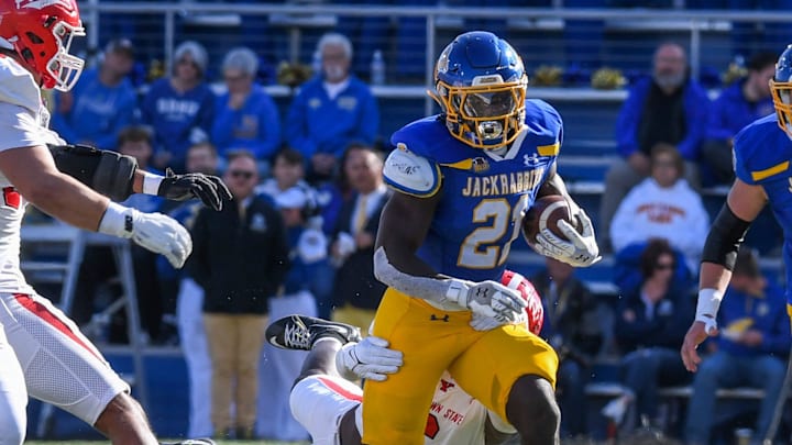 South Dakota State Jackrabbits running back Angel Johnson (21) rushes with the ball on Saturday, Oct. 12, 2024, at Dana J. Dykhouse Stadium in Brookings. South Dakota State Jackrabbits running back Angel Johnson (21) rushes with the ball on Saturday, Oct. 12, 2024, at Dana J. Dykhouse Stadium in Brookings.