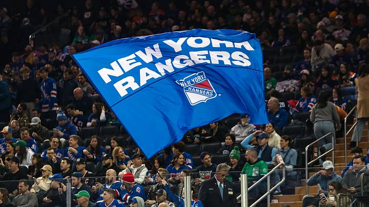 Mar 16, 2025; New York, New York, USA; A New York Rangers flag is seen in the crown during the first period against the Edmonton Oilers at Madison Square Garden. Mar 16, 2025; New York, New York, USA; A New York Rangers flag is seen in the crown during the first period against the Edmonton Oilers at Madison Square Garden.
