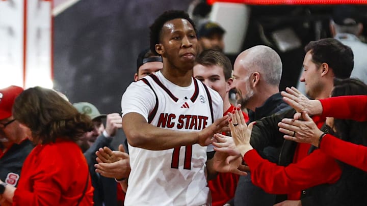 Feb 7, 2026; Raleigh, North Carolina, USA;  NC State Wolfpack guard Quadir Copeland (11) thanks the fans after the second half of the game against the Virginia Tech Hokies at Lenovo Center. Mandatory Credit: Jaylynn Nash-Imagn Images