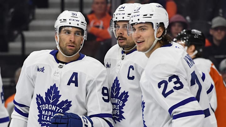 Jan 7, 2025; Philadelphia, Pennsylvania, USA; Toronto Maple Leafs center John Tavares (91), center Auston Matthews (34) and left wing Matthew Knies (23) against the Philadelphia Flyers  at Wells Fargo Center. Mandatory Credit: Eric Hartline-Imagn Images