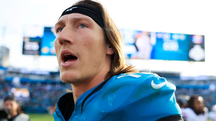 Jacksonville Jaguars quarterback Trevor Lawrence (16) looks to congratulate other Buffalo Bills players after the game of an NFL football AFC Wild Card playoff matchup, Sunday, Jan. 11, 2026, in Jacksonville, Fla. The Bills defeated the Jaguars 27-24.