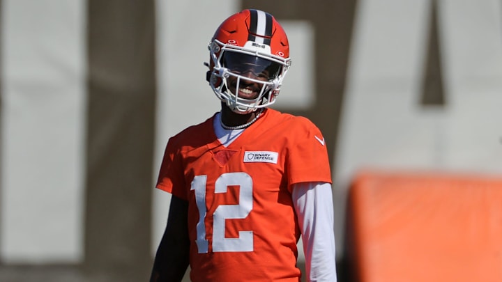 Cleveland Browns quarterback Shedeur Sanders (12) jokes around during NFL training camp practice at the Cleveland Browns training facility, Wednesday, July 23, 2025, in Berea, Ohio.