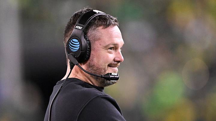 Dec 20, 2025; Eugene, OR, USA; Oregon Ducks head coach Dan Lanning smiles during the third quarter against the James Madison Dukes at Autzen Stadium. Mandatory Credit: Craig Strobeck-Imagn Images Dec 20, 2025; Eugene, OR, USA; Oregon Ducks head coach Dan Lanning smiles during the third quarter against the James Madison Dukes at Autzen Stadium. Mandatory Credit: Craig Strobeck-Imagn Images