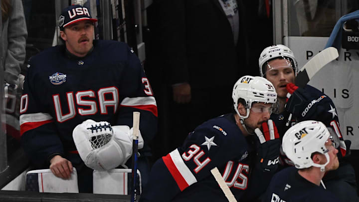Feb 20, 2025; Boston, MA, USA; [Imagn Images direct customers only]  Team USA look on as Team Canada celebrate after the overtime goal by forward Connor McDavid (97) (not pictured) during the 4 Nations Face-Off ice hockey championship game at TD Garden. Mandatory Credit: Winslow Townson-Imagn Images