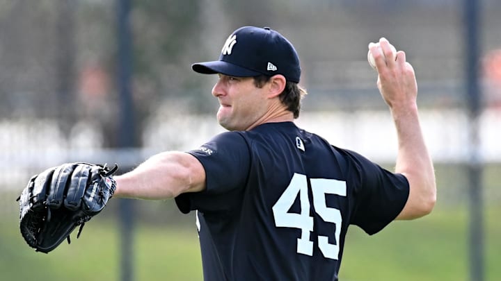 Feb 16, 2025; Tampa, FL, USA; New York Yankees pitcher Gerrit Cole (45) warms up during a spring training workout  at George M. Steinbrenner Field.