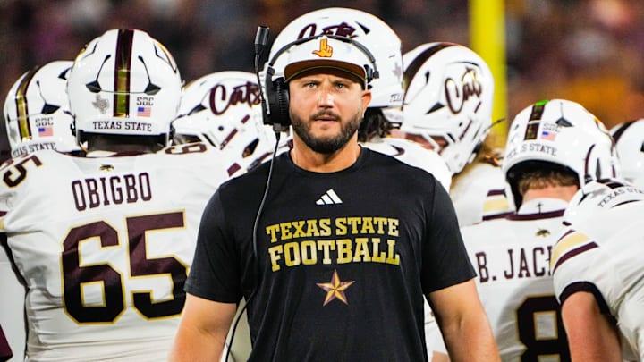 Sep 13, 2025; Tempe, Arizona, USA; Texas State Bobcats head coach G. J. Kinne during a time out in the first quarter of the game between Arizona State Sun Devils and Texas State Bobcats. Mandatory Credit: Arianna Grainey-Imagn Images