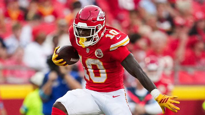 Aug 28, 2026; Kansas City, Missouri, USA; Kansas City Chiefs running back Emmett Johnson (10) leaps over Seattle Seahawks cornerback Noah Igbinoghene (17) during the first half at Arrowhead Stadium. Mandatory Credit: Jay Biggerstaff-Imagn Images Aug 28, 2026; Kansas City, Missouri, USA; Kansas City Chiefs running back Emmett Johnson (10) leaps over Seattle Seahawks cornerback Noah Igbinoghene (17) during the first half at Arrowhead Stadium. Mandatory Credit: Jay Biggerstaff-Imagn Images