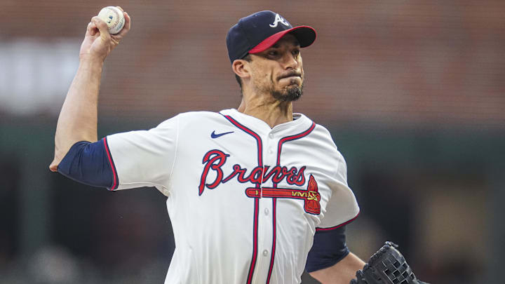 Sep 4, 2024; Cumberland, Georgia, USA; Atlanta Braves pitcher Charlie Morton (50) pitches against the Colorado Rockies during the first inning at Truist Park. Mandatory Credit: Dale Zanine-Imagn Images