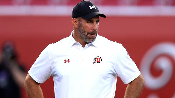Utah Utes head coach Morgan Scalley watches his players warm up before their game against the Idaho Vandals at Rice-Eccles Stadium.  