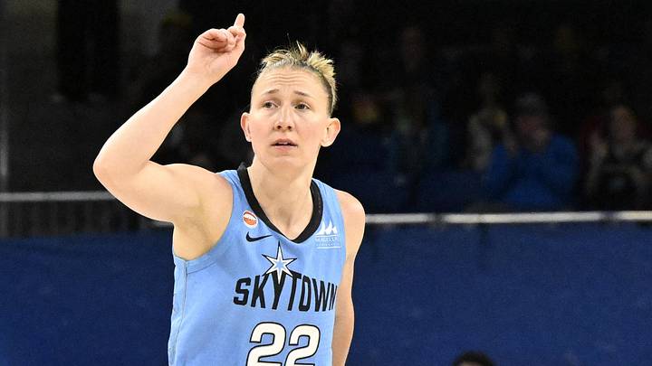 Jun 26, 2026; Chicago, Illinois, USA;  Chicago Sky guard Courtney Vandersloot (22) points as she enters the game during the first half against the Portland Fire at Wintrust Arena. Mandatory Credit: Matt Marton-Imagn Images