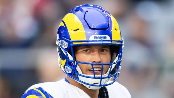 Dec 7, 2025; Glendale, Arizona, USA; Los Angeles Rams quarterback Matthew Stafford (9) against the Arizona Cardinals at State Farm Stadium. Mandatory Credit: Mark J. Rebilas-Imagn Images