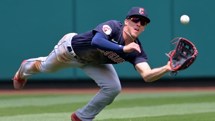 Apr 28, 2022; Anaheim, California, USA;  Cleveland Guardians center fielder Myles Straw (7) makes a diving catch off a ball hit by Los Angeles Angels right fielder Taylor Ward (3) in the first inning of the game at Angel Stadium. Mandatory Credit: Jayne Kamin-Oncea-Imagn Images