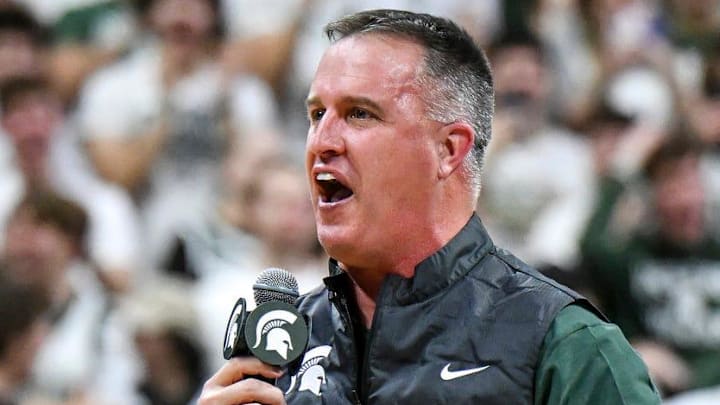 Michigan State's new football coach Pat Fitzgerald addresses the crowd during a timeout in the first half of the Spartans basketball game against Iowa on Tuesday, Dec. 2, 2025, at the Breslin Center in East Lansing. Michigan State's new football coach Pat Fitzgerald addresses the crowd during a timeout in the first half of the Spartans basketball game against Iowa on Tuesday, Dec. 2, 2025, at the Breslin Center in East Lansing.
