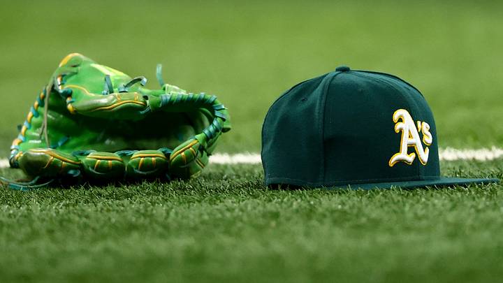Jul 22, 2025; Arlington, Texas, USA; Athletics glove and hat on the field before the game against the Texas Rangers at Globe Life Field. Mandatory Credit: Kevin Jairaj-Imagn Images Jul 22, 2025; Arlington, Texas, USA; Athletics glove and hat on the field before the game against the Texas Rangers at Globe Life Field. Mandatory Credit: Kevin Jairaj-Imagn Images