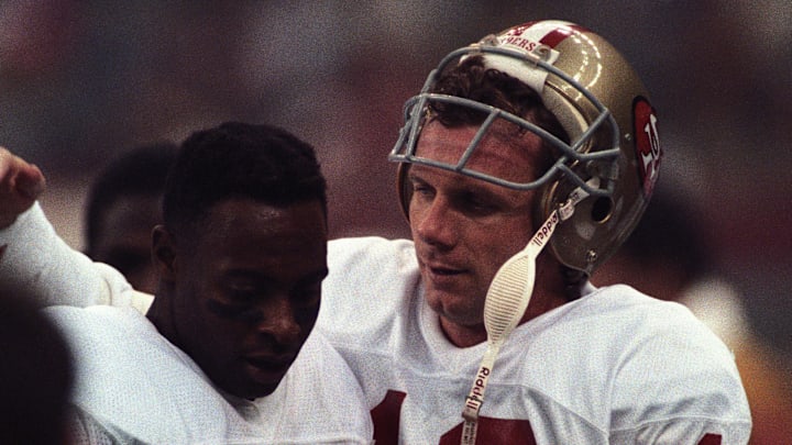 San Francisco 49ers quarterback Joe Montana (16) with receiver Jerry Rice (80)