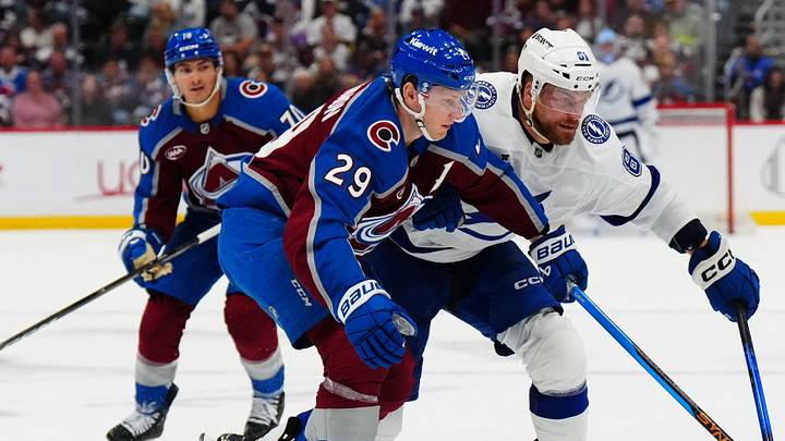 Oct 23, 2026; Denver, Colorado, USA; Colorado Avalanche center Nathan MacKinnon (29) battles for the puck against Tampa Bay Lightning defense Erik Cernak (81) in the third period at Ball Arena. Mandatory Credit: Ron Chenoy-Imagn Images Oct 23, 2026; Denver, Colorado, USA; Colorado Avalanche center Nathan MacKinnon (29) battles for the puck against Tampa Bay Lightning defense Erik Cernak (81) in the third period at Ball Arena. Mandatory Credit: Ron Chenoy-Imagn Images
