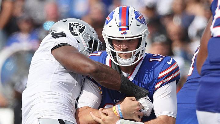 Bills quarterback Josh Allen is sacked by Raiders Divine Deablo . Bills quarterback Josh Allen is sacked by Raiders Divine Deablo .