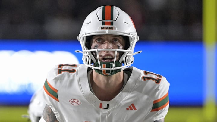 Oct 4, 2025; Tallahassee, Florida, USA; Miami Hurricanes quarterback Carson Beck (11) at the line during the first half against the Florida State Seminoles at Doak S. Campbell Stadium. Mandatory Credit: Melina Myers-Imagn Images