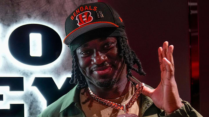 Cincinnati Bengals first round draft pick Shemar Stewart and his dad Moe Marquez show off custom jewelry they had made for each other in the Bengals locker room at Paycor Stadium in downtown Cincinnati on Friday, April 25, 2025.