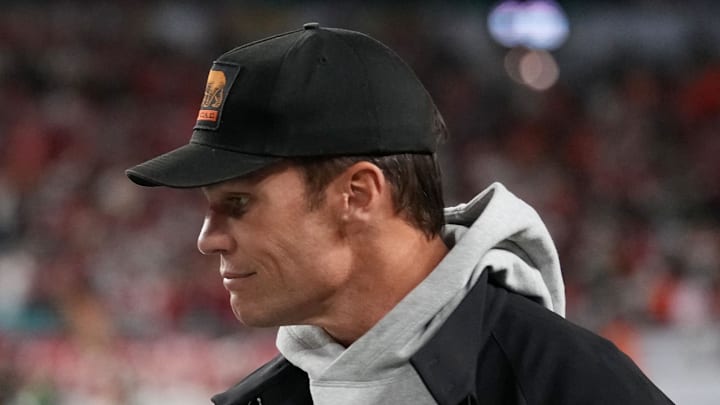 Jan 19, 2026; Miami Gardens, FL, USA; Egon Durban walks on the sideline with Tom Brady before the CFP National Championship college football game between the Indiana Hoosiers and the Miami Hurricanes at Hard Rock Stadium. Mandatory Credit: Kirby Lee-Imagn Images