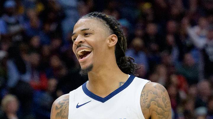 Memphis Grizzlies guard Ja Morant (12) celebrates a score to even the game during the fourth quarter against the New Orleans Pelicans at the Smoothie King Center on December 19, 2023.