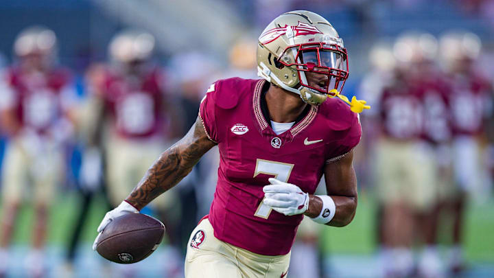 Sep 5, 2023; Orlando, Florida, USA; Florida State Seminoles wide receiver Destyn Hill (7) warms up before kickoff at Camping World Stadium on Sunday, Sept. 3, 2023. Mandatory Credit: Alicia Devine-Imagn Images