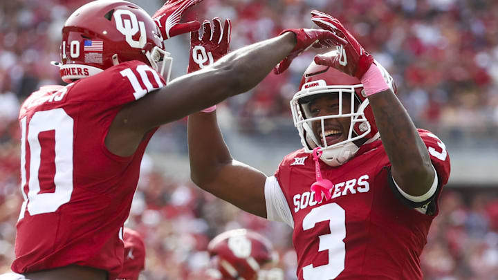 Oklahoma Sooners safety Robert Spears-Jennings (3) celebrates with linebacker Kip Lewis. Oklahoma Sooners safety Robert Spears-Jennings (3) celebrates with linebacker Kip Lewis.