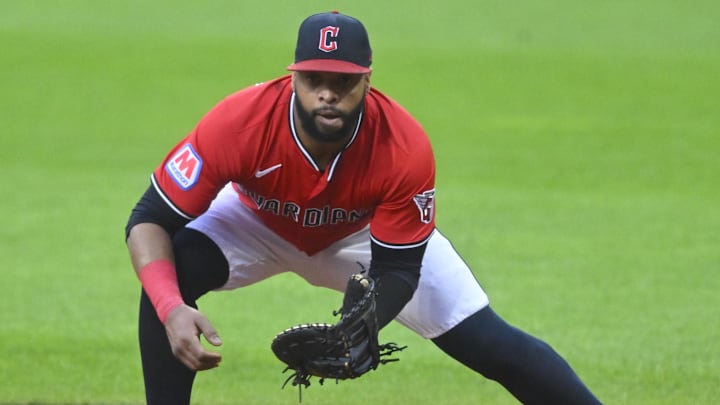 Aug 25, 2025; Cleveland, Ohio, USA; Cleveland Guardians first baseman Carlos Santana (41) fields a ground ball in the third inning against the Tampa Bay Rays at Progressive Field. Mandatory Credit: David Richard-Imagn Images