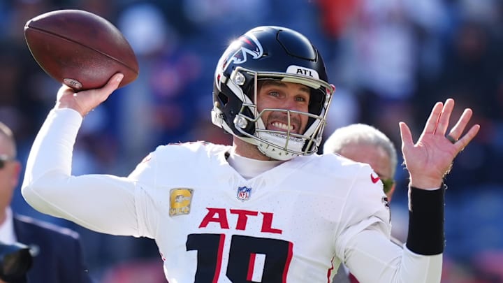 Nov 17, 2024; Denver, Colorado, USA;  Atlanta Falcons quarterback Kirk Cousins (18) warms up before the game against the Denver Broncos at Empower Field at Mile High. Mandatory Credit: Ron Chenoy-Imagn Images