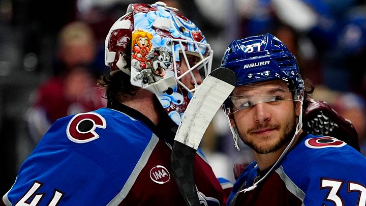 May 5, 2026; Denver, Colorado, USA; Colorado Avalanche defenseman Nick Blankenburg (37) and goaltender Scott Wedgewood (41) celebrate defeating the Minnesota Wild following game two of the second round of the 2026 Stanley Cup Playoffs at Ball Arena. Mandatory Credit: Ron Chenoy-Imagn Images