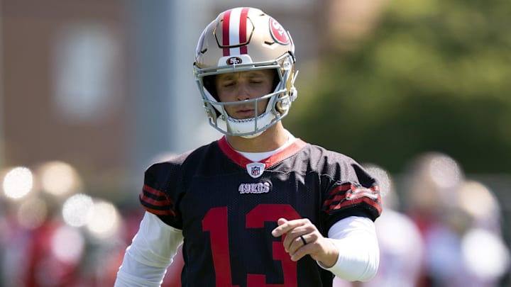 Jun 11, 2025; Santa Clara, CA, USA; San Francisco 49ers quarterback Brock Purdy (13) awaits his turn in a passing drill during a team OTA at Levi's Stadium. Mandatory Credit: D. Ross Cameron-Imagn Images