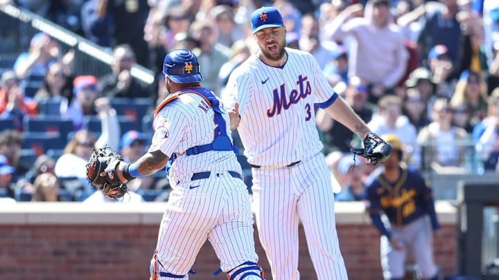 Mar 31, 2024; New York City, New York, USA;  New York Mets starting pitcher Tylor Megill (38) and