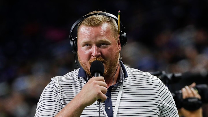 Former Lions player T.J. Lang works as sideline reporter  during the second half of the preseason game at Ford Field 