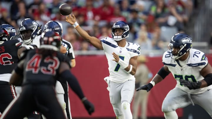 Dec 8, 2024; Glendale, Arizona, USA; Seattle Seahawks quarterback Geno Smith (7) against the Arizona Cardinals in the second half at State Farm Stadium. Mandatory Credit: Mark J. Rebilas-Imagn Images