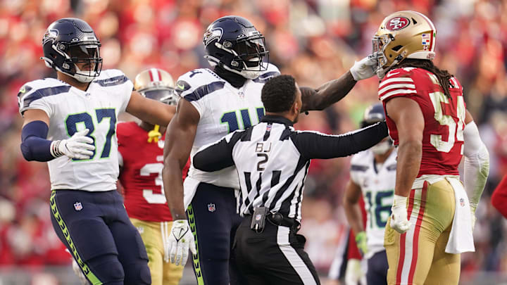 Dec 10, 2023; Santa Clara, California, USA; Seattle Seahawks wide receiver DK Metcalf (14) grabs the face mask of San Francisco 49ers linebacker Fred Warner (54) after the end of play in the fourth quarter at Levi's Stadium. Dec 10, 2023; Santa Clara, California, USA; Seattle Seahawks wide receiver DK Metcalf (14) grabs the face mask of San Francisco 49ers linebacker Fred Warner (54) after the end of play in the fourth quarter at Levi's Stadium.