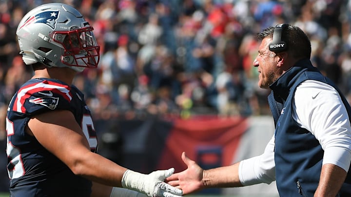 Sep 28, 2025; Foxborough, Massachusetts, USA; New England Patriots head coach Mike Vrable congratulates offensive tackle Will Campbell (66) after a touchdown during the first half against the Carolina Panthers at Gillette Stadium. Mandatory Credit: Bob DeChiara-Imagn Images