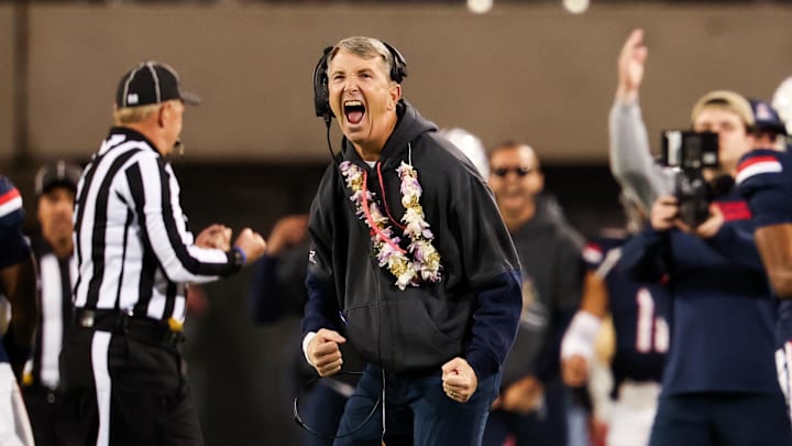 Nov 15, 2024; Tucson, Arizona, USA; Arizona Wildcats head coach Brent Brennan celebrates a interception made against the Houston Cougars during the second quarter at Arizona Stadium. Mandatory Credit: Aryanna Frank-Imagn Images