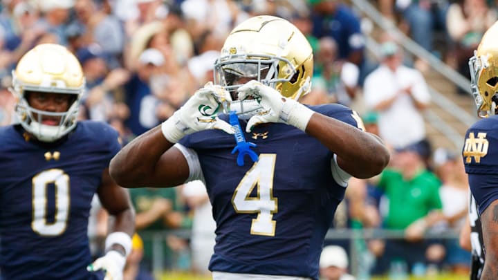 Notre Dame running back Jeremiyah Love celebrates after scoring a touchdown against Purdue Notre Dame running back Jeremiyah Love celebrates after scoring a touchdown against Purdue