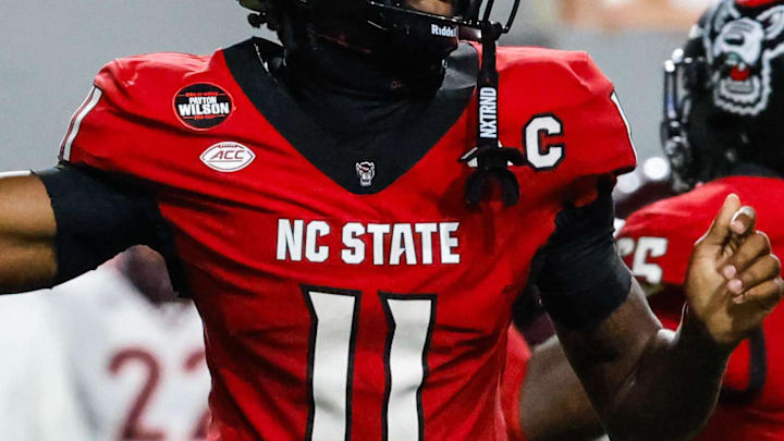 Sep 27, 2025; Raleigh, North Carolina, USA; North Carolina State Wolfpack quarterback CJ Bailey (11) with the ball during the first half of the game against Virginia Tech Hokies at Carter-Finley Stadium. Mandatory Credit: Jaylynn Nash-Imagn Images Sep 27, 2025; Raleigh, North Carolina, USA; North Carolina State Wolfpack quarterback CJ Bailey (11) with the ball during the first half of the game against Virginia Tech Hokies at Carter-Finley Stadium. Mandatory Credit: Jaylynn Nash-Imagn Images