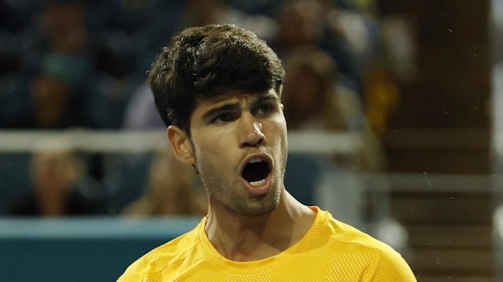 Carlos Alcaraz reacts after winning a point Carlos Alcaraz reacts after winning a point