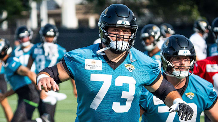Jacksonville Jaguars center Robert Hainsey (73) warms up with Jacksonville Jaguars center Luke Fortner (79) during the seventh organized team activity at the Miller Electric Center in Jacksonville, Fla. Monday, June 2, 2025. [Doug Engle/Florida Times-Union]