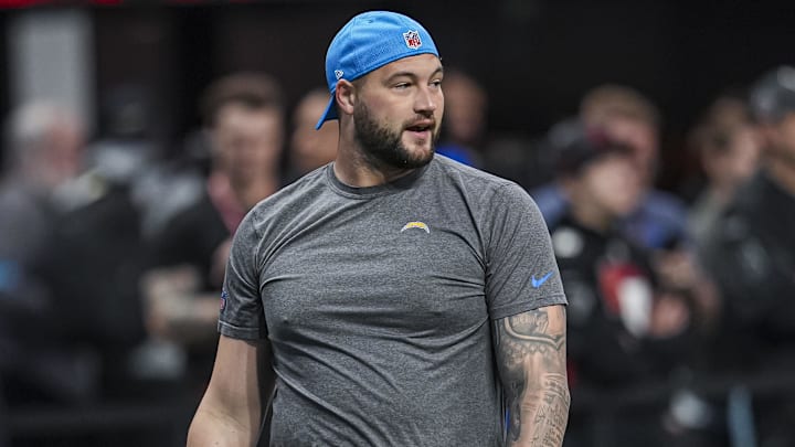 Dec 1, 2024; Atlanta, Georgia, USA; Los Angeles Chargers defensive end Morgan Fox (56) shown on the field before the game against the Atlanta Falcons at Mercedes-Benz Stadium. 