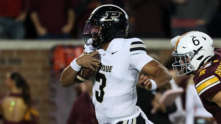 Purdue Boilermakers quarterback Malachi Singleton (3) runs the ball for a touchdown Purdue Boilermakers quarterback Malachi Singleton (3) runs the ball for a touchdown