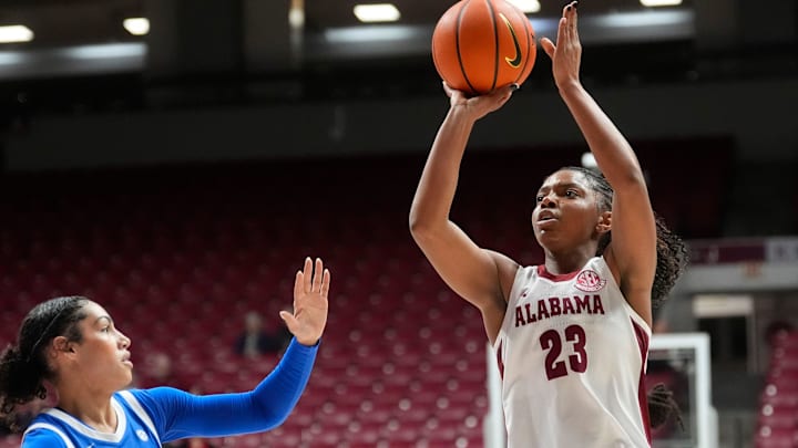 Jan 8, 2026; Tuscaloosa, AL, USA; Alabama guard Jessica Timmons (23) shoots over Kentucky guard Asia Boone (8) at Coleman Coliseum.