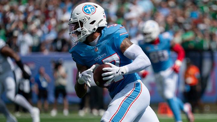 Tennessee safety Amani Hooker runs the ball out of the end zone after intercepting Philadelphia quarterback Jalen Hurts pass. Tennessee safety Amani Hooker runs the ball out of the end zone after intercepting Philadelphia quarterback Jalen Hurts pass.
