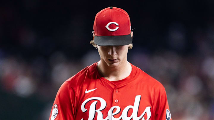 Cincinnati Reds pitcher Brady Singer reacts