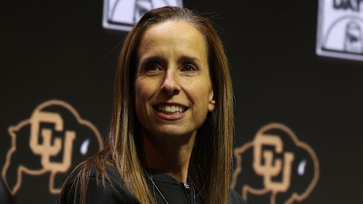 Oct 21, 2025; Kansas City, MO, USA; Colorado head coach JR Payne speaks to media during Big 12 Womenís Basketball Media Day at T-Mobile Center.